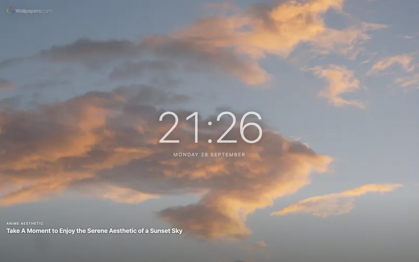 Nuova scheda con un grande orologio e la data su uno sfondo di cielo al tramonto